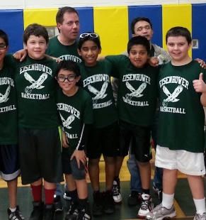 Vishnu and Chrisvin with their seventh-grade basketball team