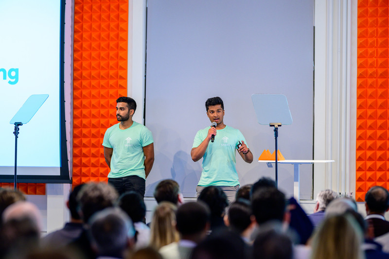 Vishnu and Chrisvin presenting Tepali on stage at Y Combinator